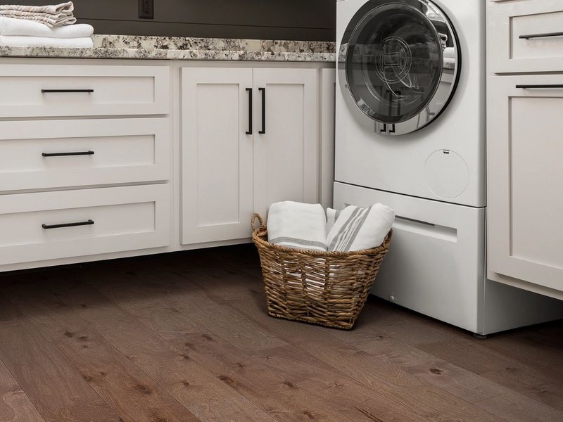 Laundry room with engineered hardwood flooring from Carpet Design Center in the Greenville, NC area